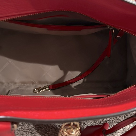 Large Michael Kors handbag with gold accents. - Picture 4 of 6